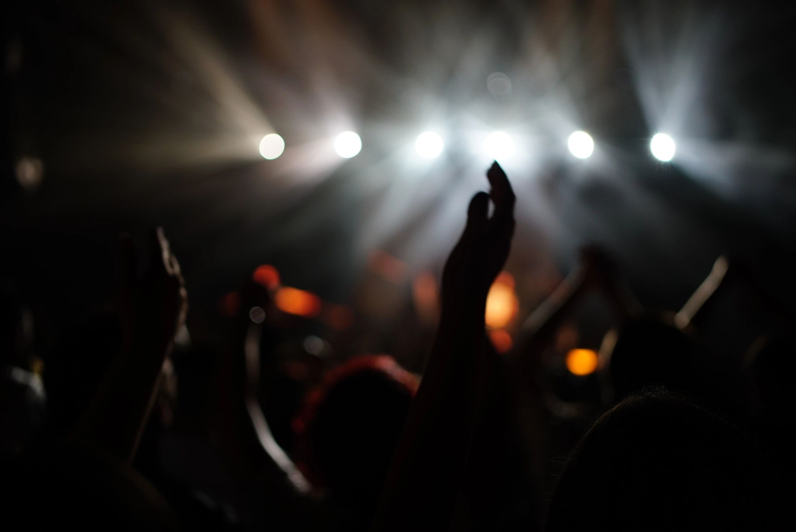 Worshippers raising their hands in praise